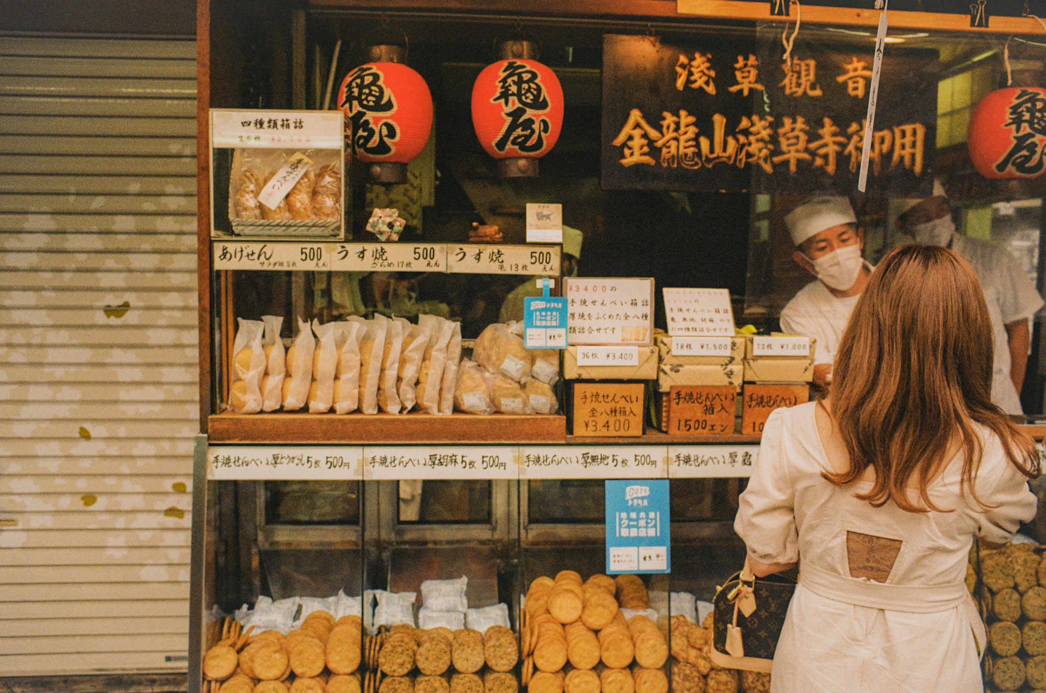 Lady ordering food at a shop